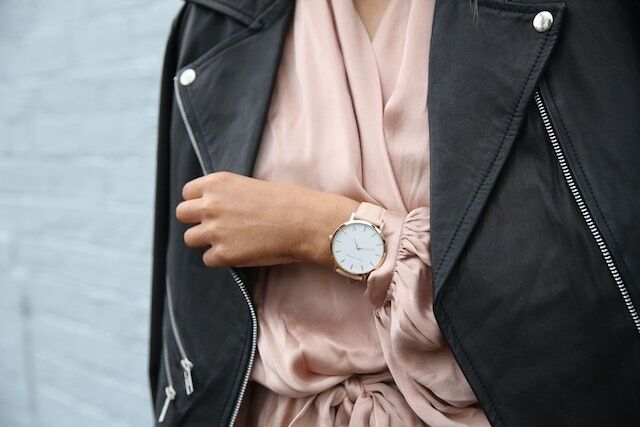Woman wears water resistant watch during normal day activities